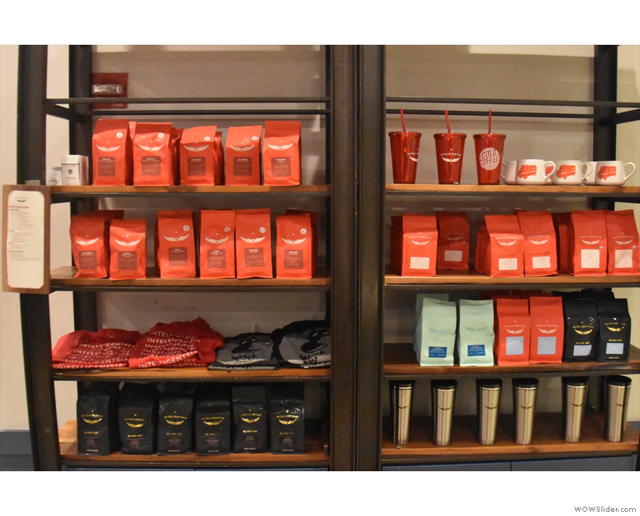 ... while the main shelves on the left are packed with bags of coffee.