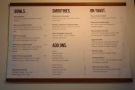 The food menu is on the wall behind the counter, brunch being served until three o'clock.