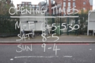 The opening times are handily written on the glass door.