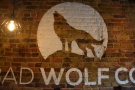 A closer look at the howling wolf logo.