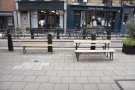 As well as the picnic table in front of the window, there's a bench and table on the...