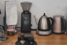 ... and on the back wall, the grinder and a kettle, plus that day's batch brew beans.