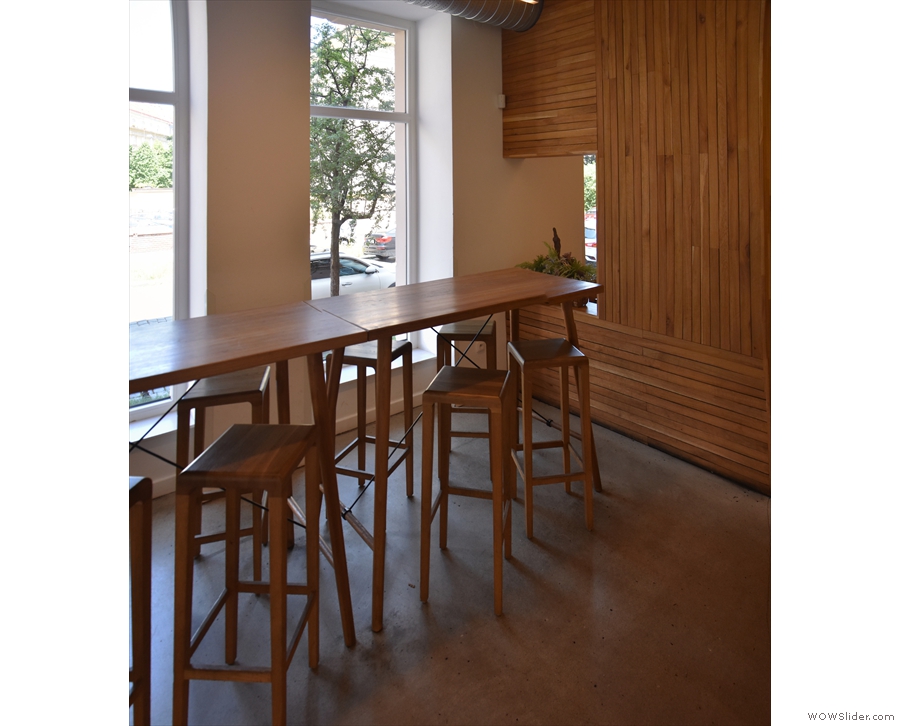 The seating starts on the opposite side with this eight-person communal table.