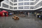 When I arrived on Friday, the Street Food Villlage was in a rainswept courtyard, its home...