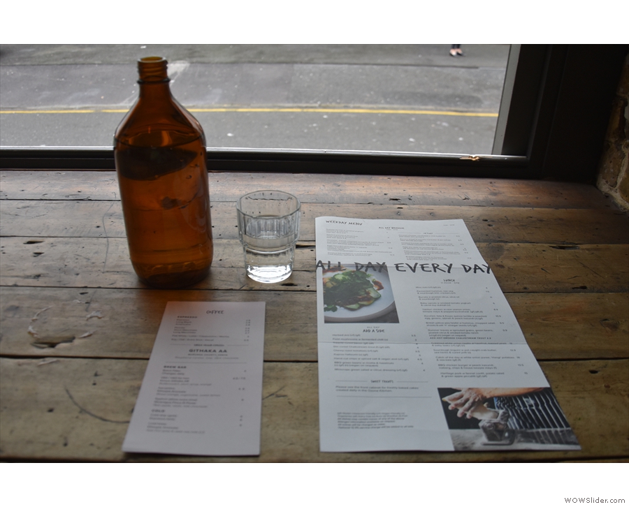 Ozone offers full table service, where you get a bottle of water and lots of menus.