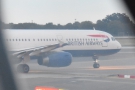 The final plane ahead of us, a British Airways one, swings onto the runway.