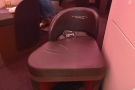 Here's the fixed footstool that every seat has, jutting out beyond the separator.