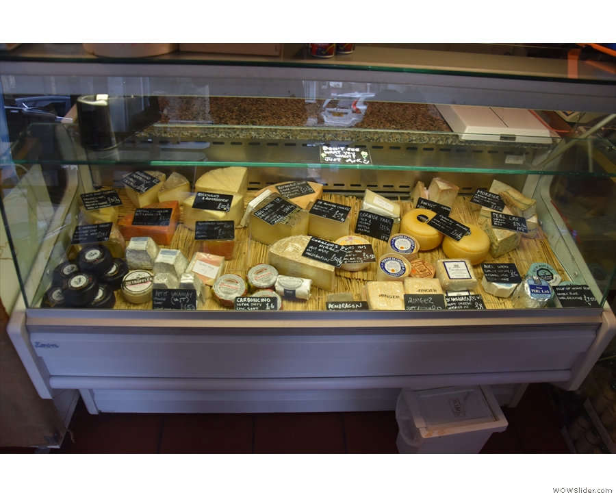 For more cheese, check out the display case on the right-hand side of the counter...