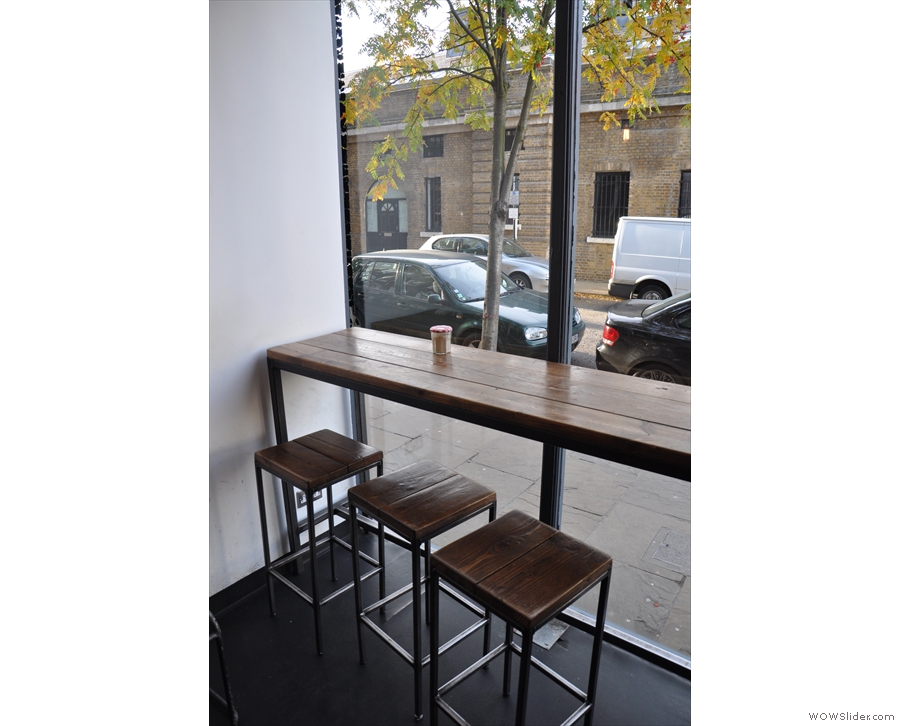 The bar seating in the front window.