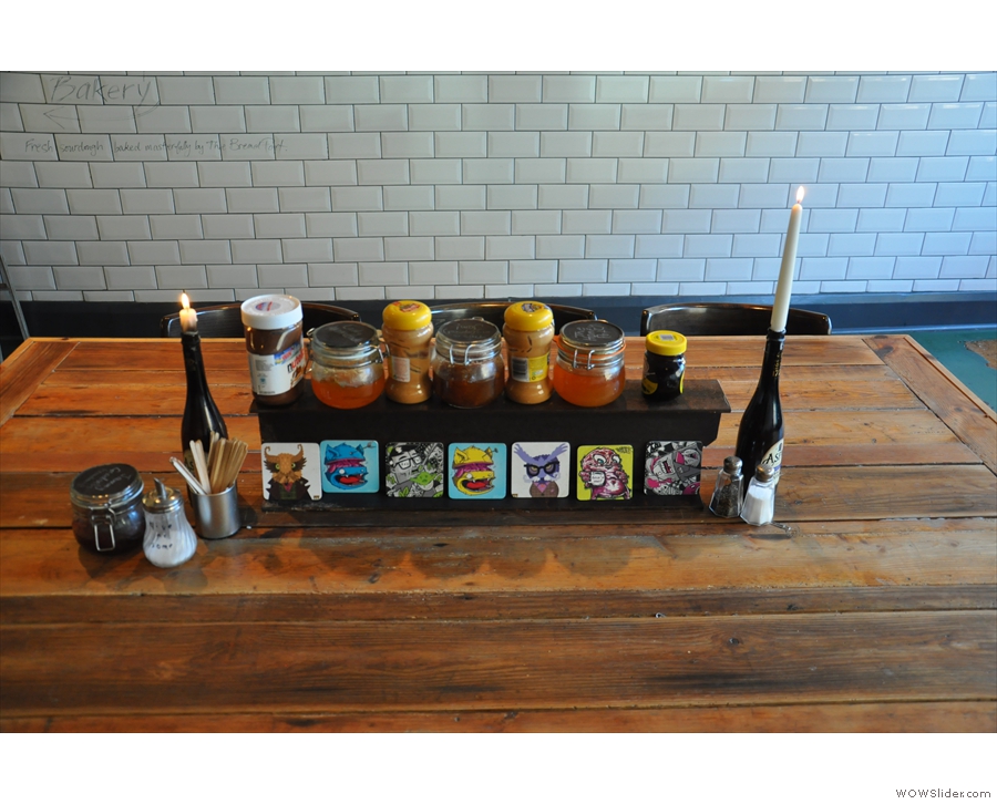 Jams and other condiments on the communal table.