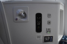 The array of sockets, controls and other bits and pieces in the seat casing. This includes...