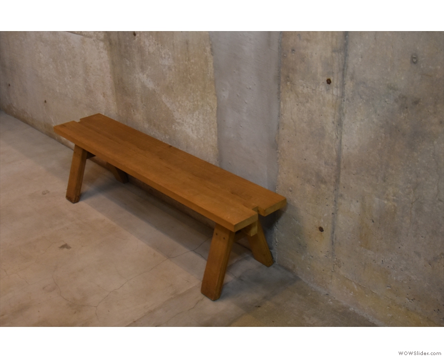 The final seating is in the shape of two short benches, one against the left-hand wall...