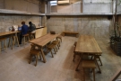 In the centre are two six-person communal tables.