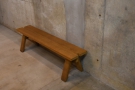 The final seating is in the shape of two short benches, one against the left-hand wall...