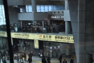 In case you're wondering how close the trains are, those are the Shinkansen gates, while...