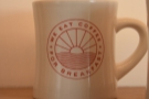 And mugs, like this one, bearing Coffee Supreme's slogan.