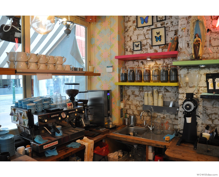 The counter, with espresso machine by the window.