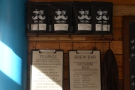 The coffee choices (along with the tea) are displayed on the back wall.