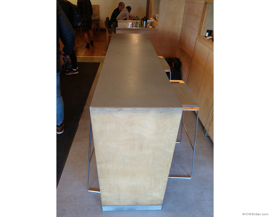 ... while on the right is this long, thin, six-person communal table.