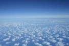 High above the North Sea, there's nothing but clouds. But wait. What's the on the horizon?