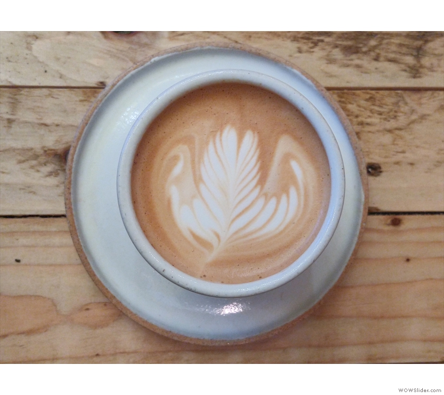 ... ceramic cup, made by a pottery in East London. Nice latte art.