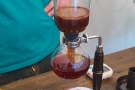 ... is removed, the coffee being drawn through the filter into the bottom chamber.
