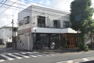 On the main east-west route through Meguro City stands this two-storey building...