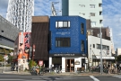 An interesting building, on a busy corner in eastern Tokyo. But what's in the background...