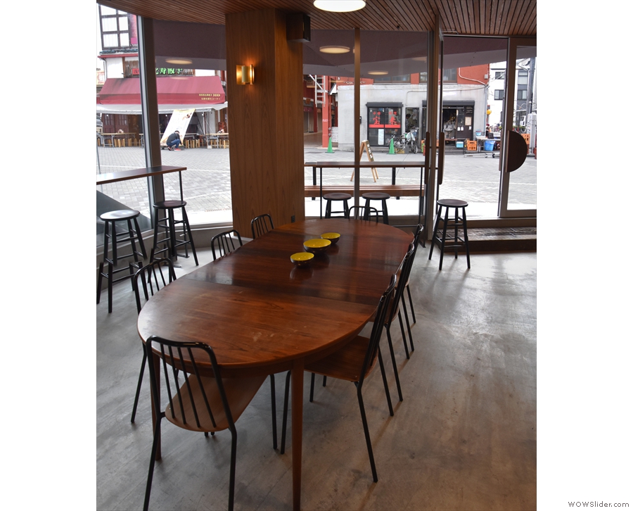 This large communal table, which was here in 2018, has been replaced by a smaller one.