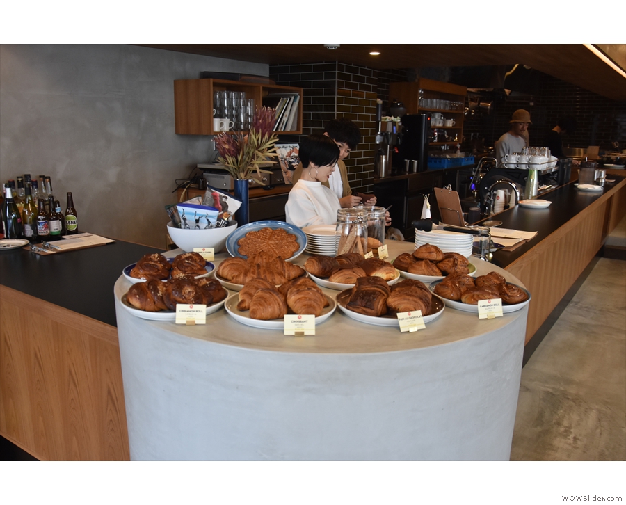 Down to business. You are greeted by an array of pastries and buns as you arrive.