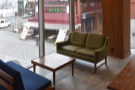 ... and a pair of two-person sofas facing each other in the window.