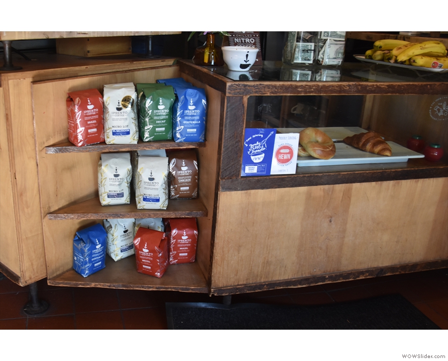 ... in a display case under the counter, complete with retail bags of beans to the left.