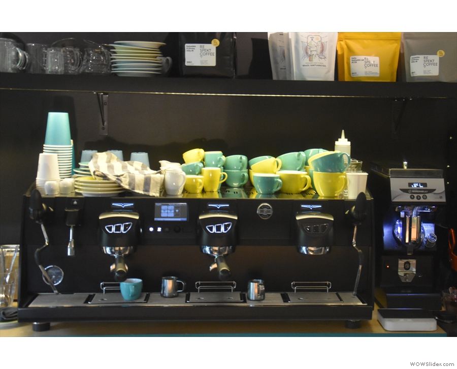 ... while the three-group Black Eagle espresso machine is at the back under the menu.