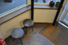 The stools by the door.