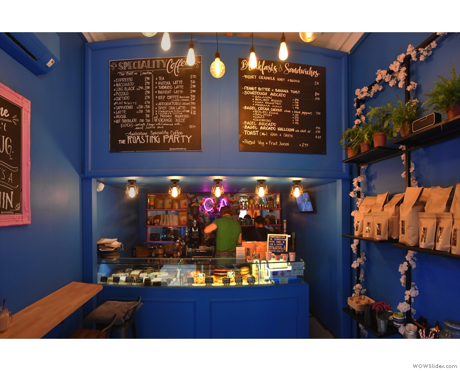 July: the cozy, colourful interior of Coffee Addict, London.
