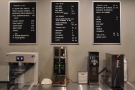 ... while the menus are on the wall above the batch brewer and hot water boiler.