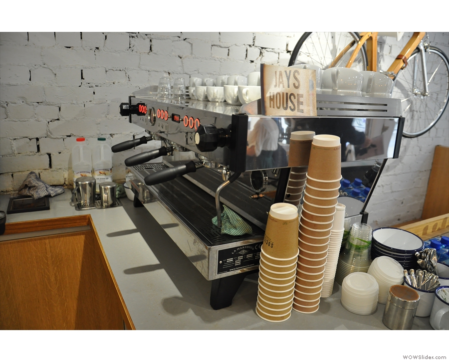 The espresso machine, a three-group La Marzocco Linea, is off to the right...