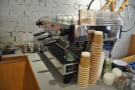 The espresso machine, a three-group La Marzocco Linea, is off to the right...