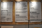 The menus hang on the wall behind the counter. This is what they looked like in 2014...