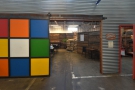 The spot being the Rubix Cube themed sliding door, which leads to the coffee shop.