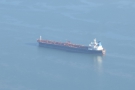 One of the many ships down below in the bay, probably heading to/from...