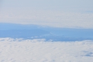My final view of the coastline, 20 minutes into the flight, through a gap in the clouds.