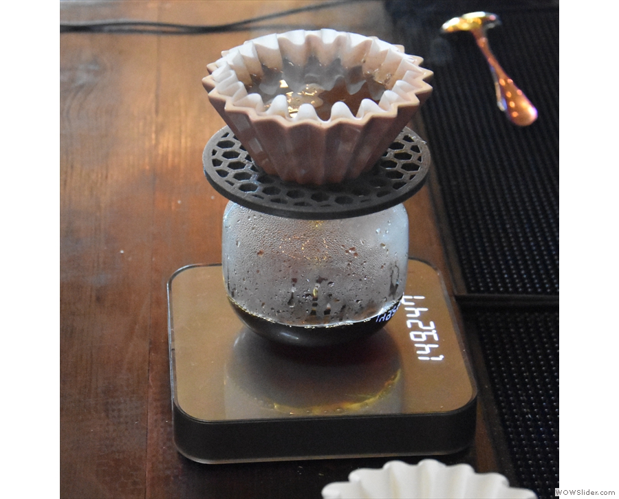 The coffee is then left to stand. Finally, there is a short third pour, where Kimhak uses...