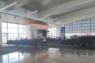 My gate, F10, was all the way down at the far end. There's plenty of seating, free WiFi...