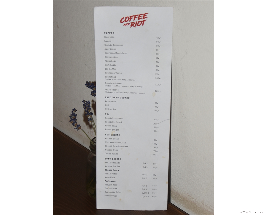 As befits table service, there are menus on the tables: coffee on one side...