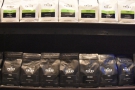 There are retail bags of blends (bottom, in black) and single-origins (top, in white)...
