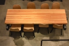The seating at the front of Press, starting with the eight-person communal table...