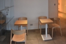 As well as the two-person table in the middle of the room, there are two more against...