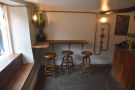 ... where you'll find this three-person, L-shaped bar.