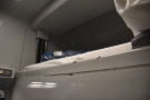 ... while the bunk itself is quite thick. Even when it's up, there's space above it!